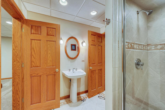 125 Briargate Road Cary, IL 60013 - Photo 16 of 24 a view of a bathroom with door