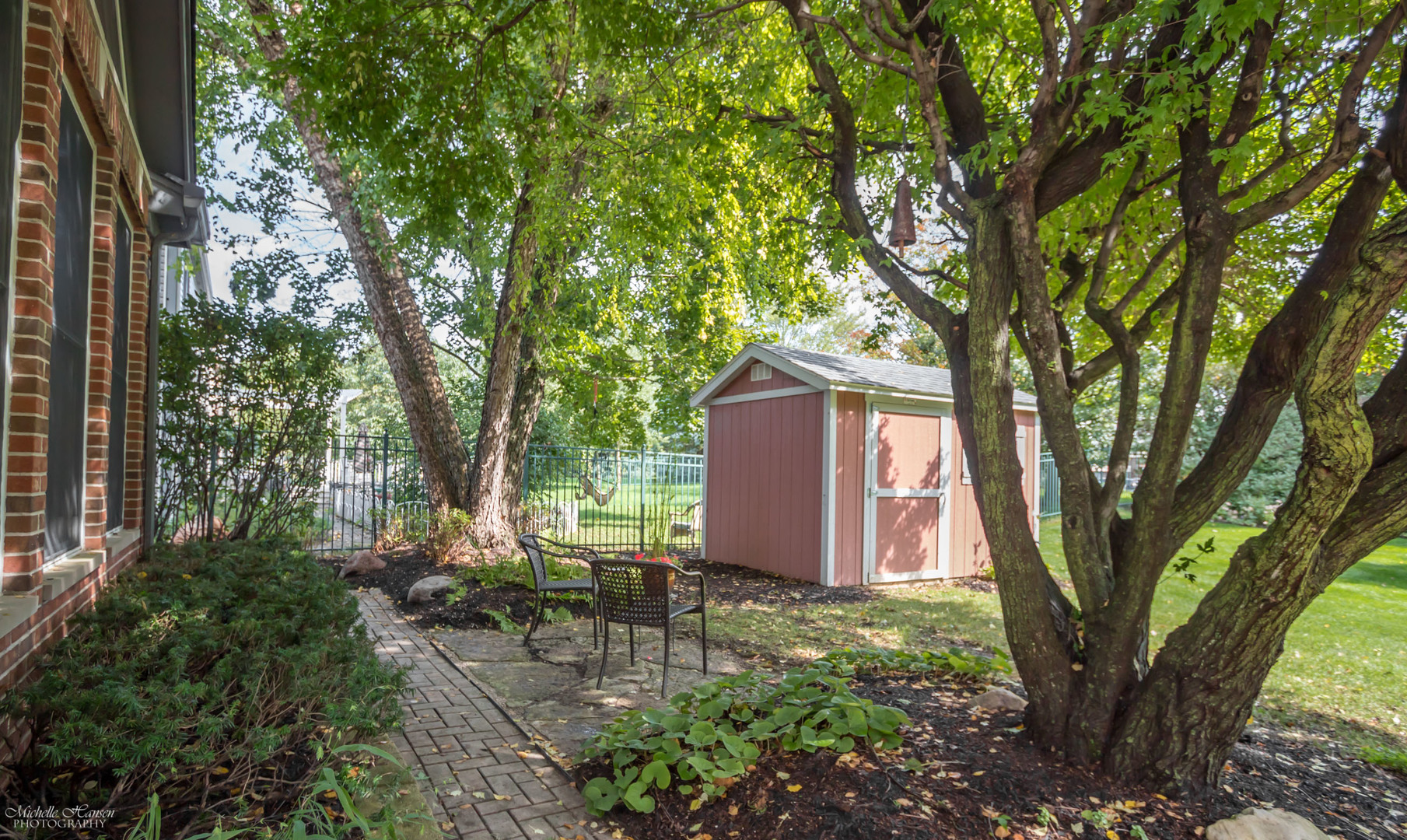 125 Briargate Road Cary, IL 60013 - Photo 22 of 24 a couple of table and chairs in a garden