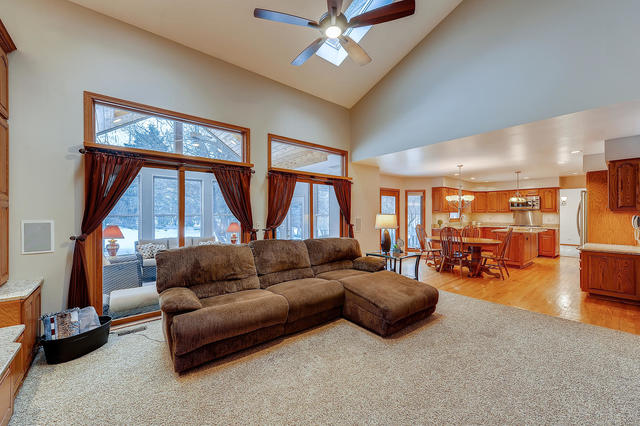 125 Briargate Road Cary, IL 60013 - Photo 9 of 24 a living room with furniture and a large window