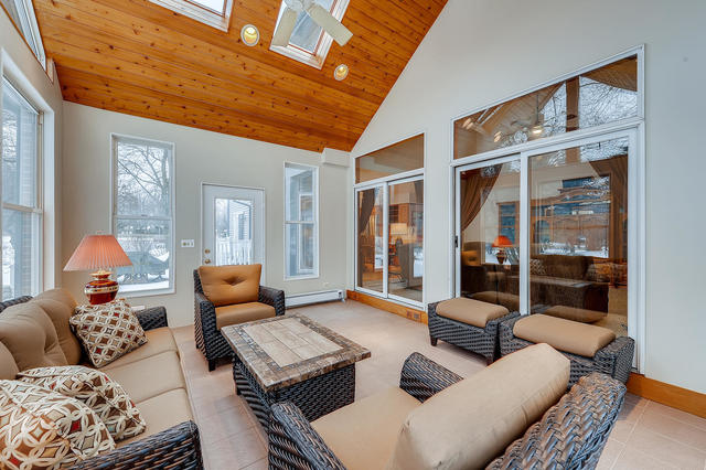 125 Briargate Road Cary, IL 60013 - Photo 10 of 24 a living room with furniture a couch and large window with outer view