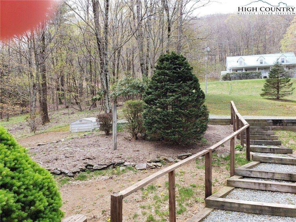 237 Green Knob Mtn Road Boone, NC 28607 - Photo 40 of 41 a view of a pathway with a wrought fence