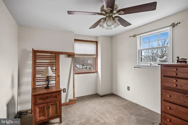 a view of workspace with furniture and natural light