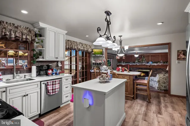 a kitchen with a sink and stove