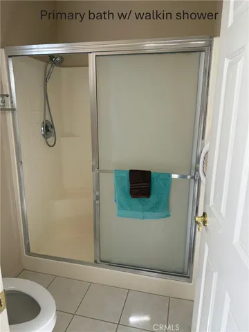 a view of a room with large windows