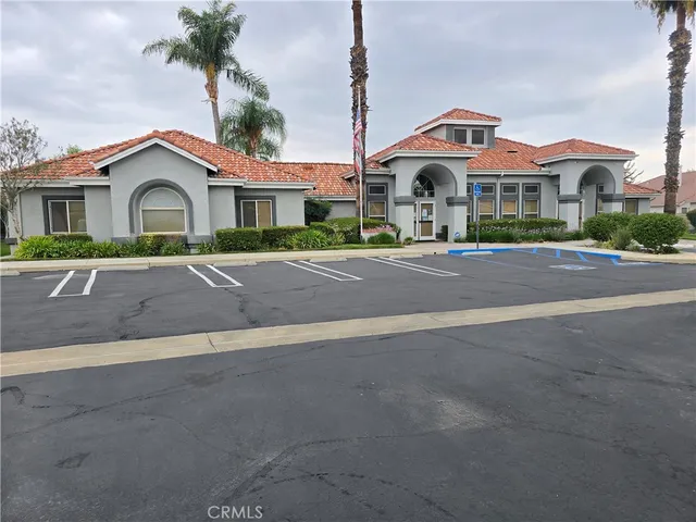 a view of a dining room with furniture and window