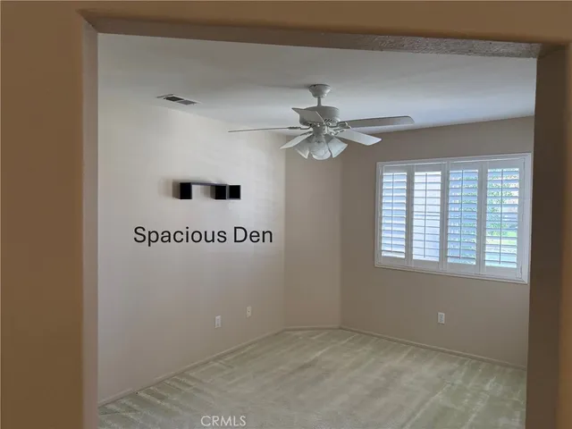 a view of kitchen with window and wooden floor