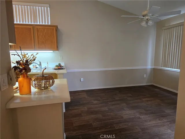 a view of kitchen with wooden floor
