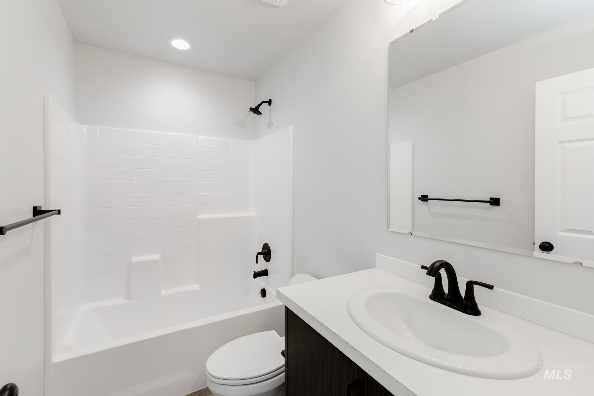 1804 West Unforgettable Street Meridian, ID 83642 - Photo 12 of 18 Bathroom with washtub / shower combination and vanity