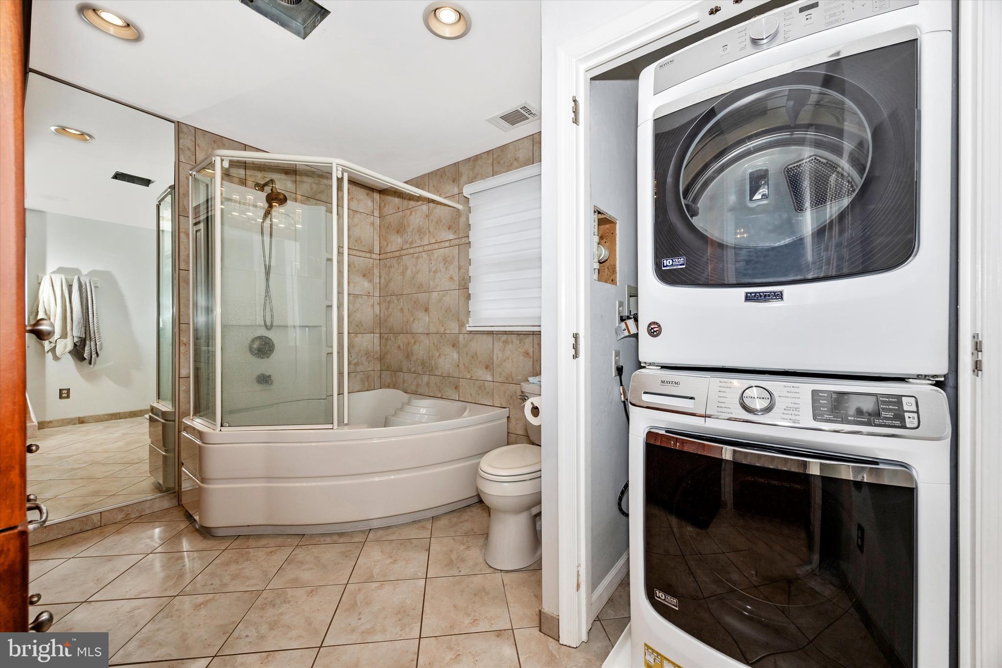 307 Redwood Avenue Frederick, MD 21701 - Photo 16 of 23 a bathroom with a sink a toilet and shower