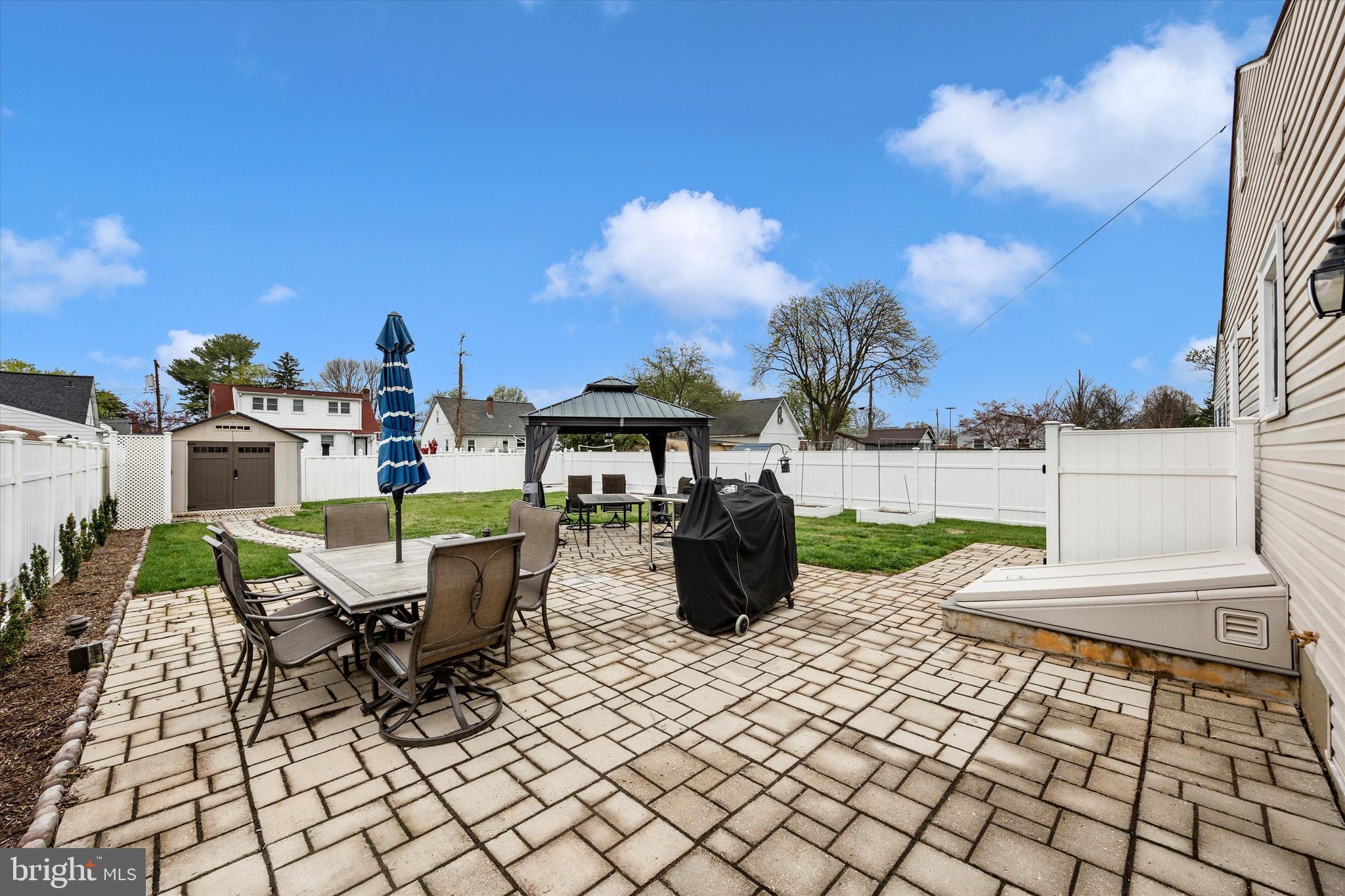 307 Redwood Avenue Frederick, MD 21701 - Photo 18 of 23 a view of a patio with a table and chairs