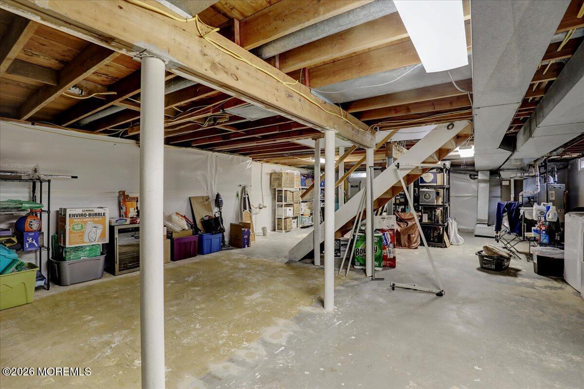 21 Prince William Road Morganville, NJ 07751 - Photo 25 of 39 a view of a garage with car parked