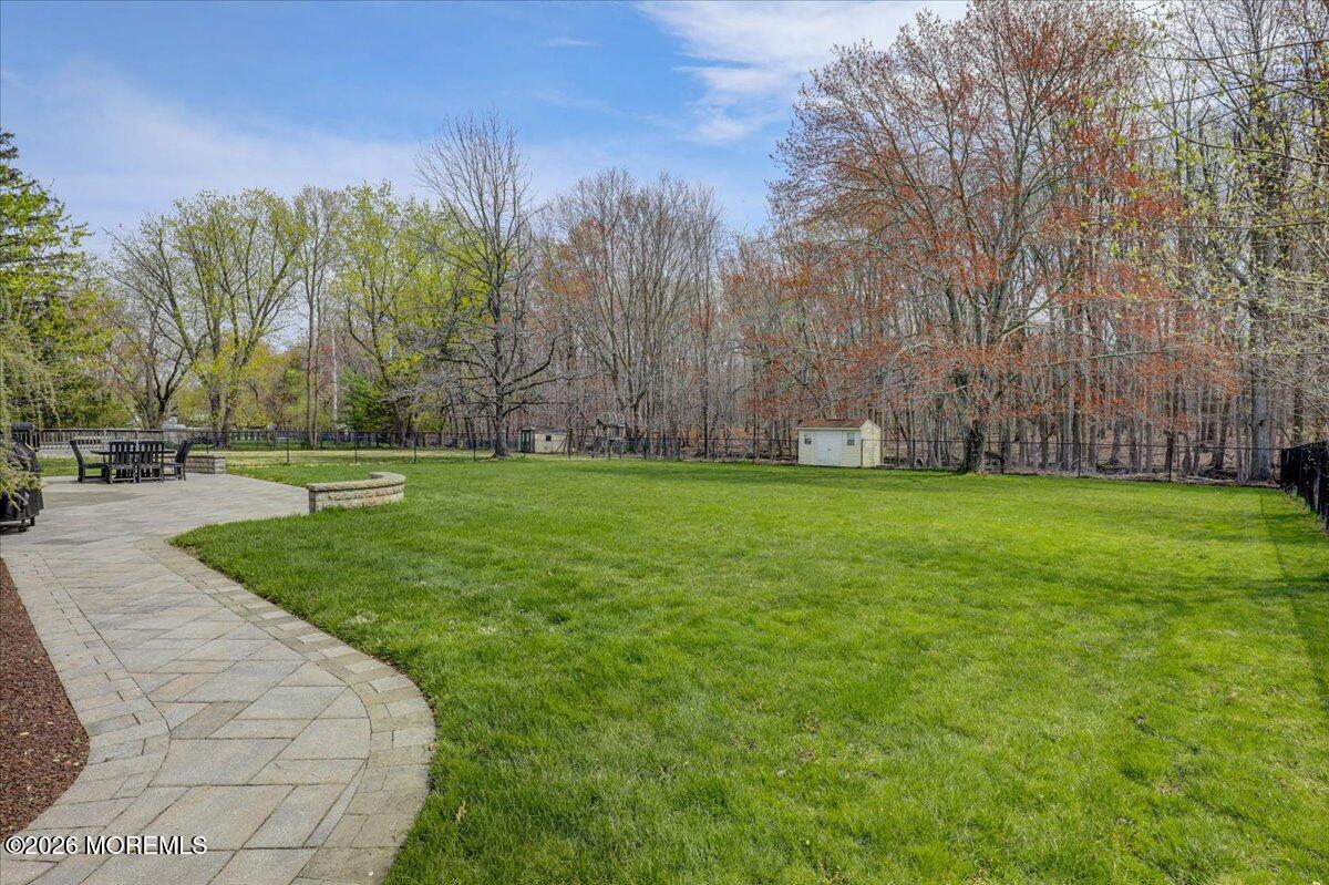 21 Prince William Road Morganville, NJ 07751 - Photo 27 of 39 a view of a park with large trees