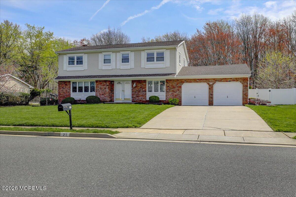 21 Prince William Road Morganville, NJ 07751 - Photo 3 of 39 a house view with a garden