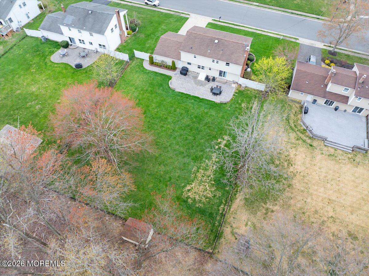 21 Prince William Road Morganville, NJ 07751 - Photo 34 of 39 a view of a house with a yard
