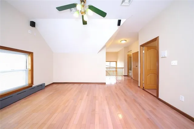 a view of an empty room and window