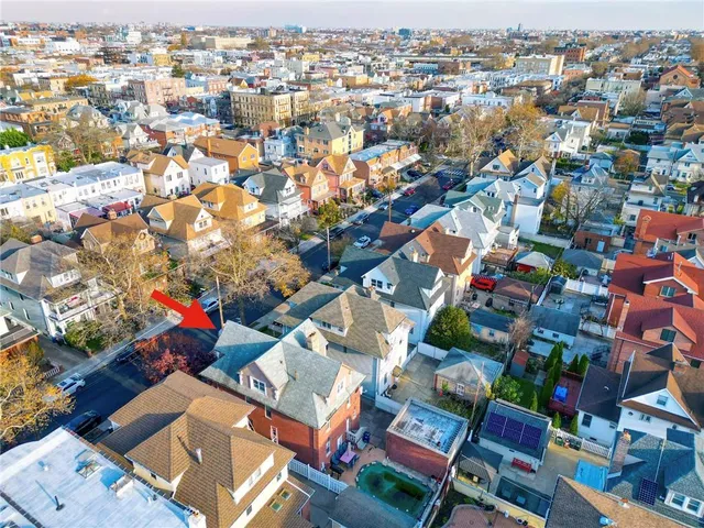 an aerial view of a city with lots of residential buildings