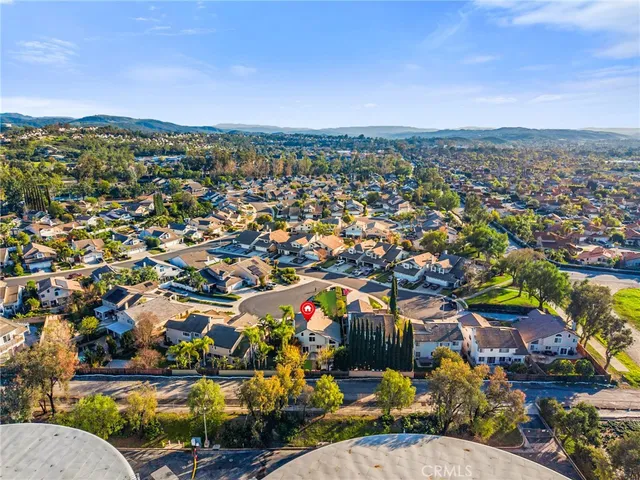 a view of swimming pool with a yard and plants