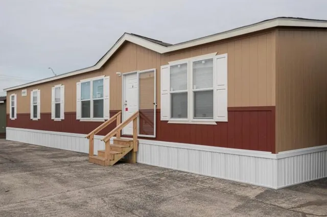 a view of wooden house with a park