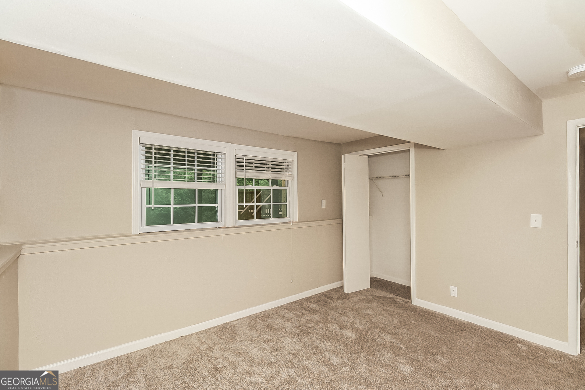 3100 Forestside Court Atlanta, GA 30349 - Photo 11 of 17 an empty room with windows