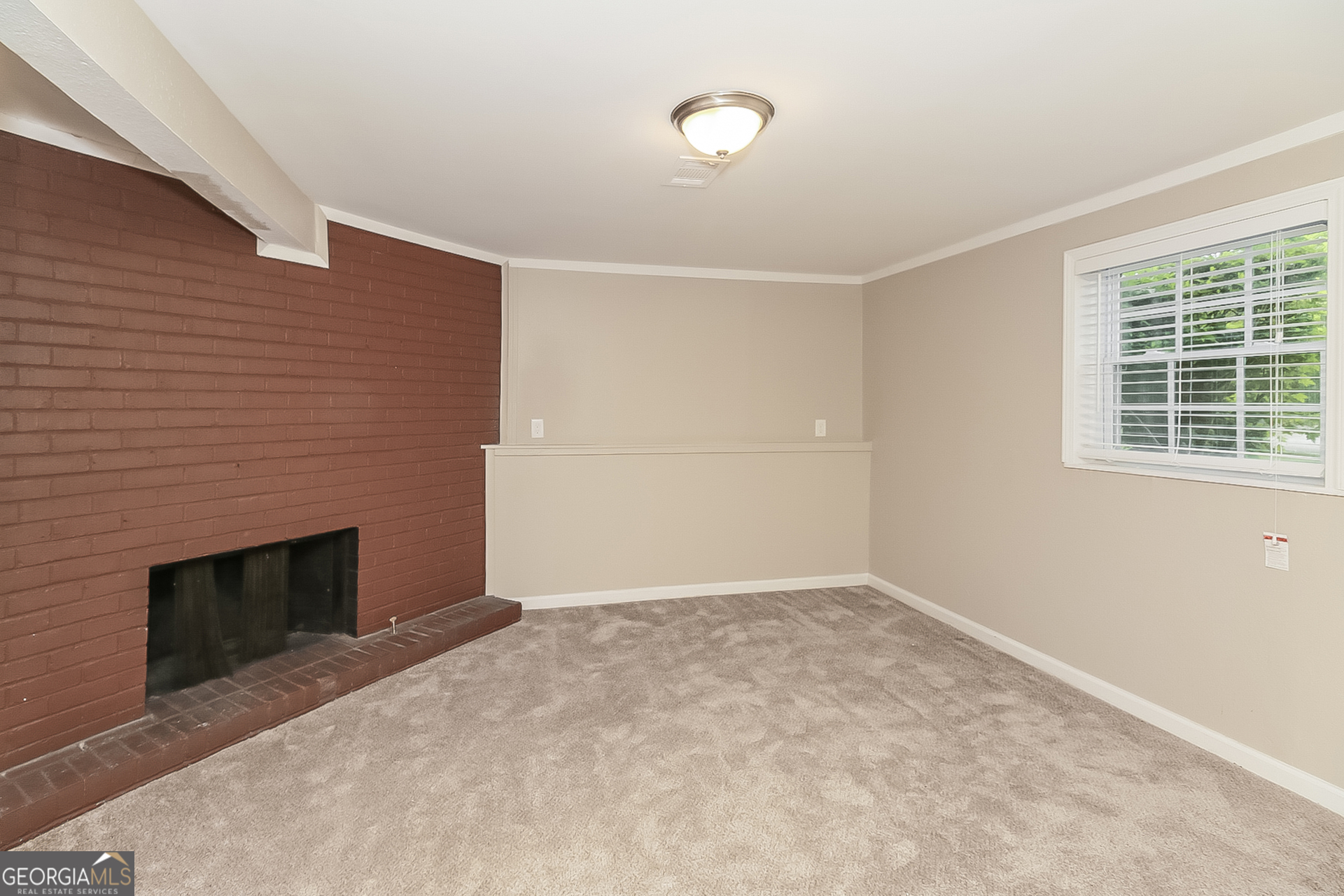 3100 Forestside Court Atlanta, GA 30349 - Photo 7 of 17 an empty room with windows