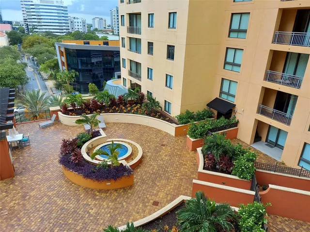 an aerial view of a house with outdoor space