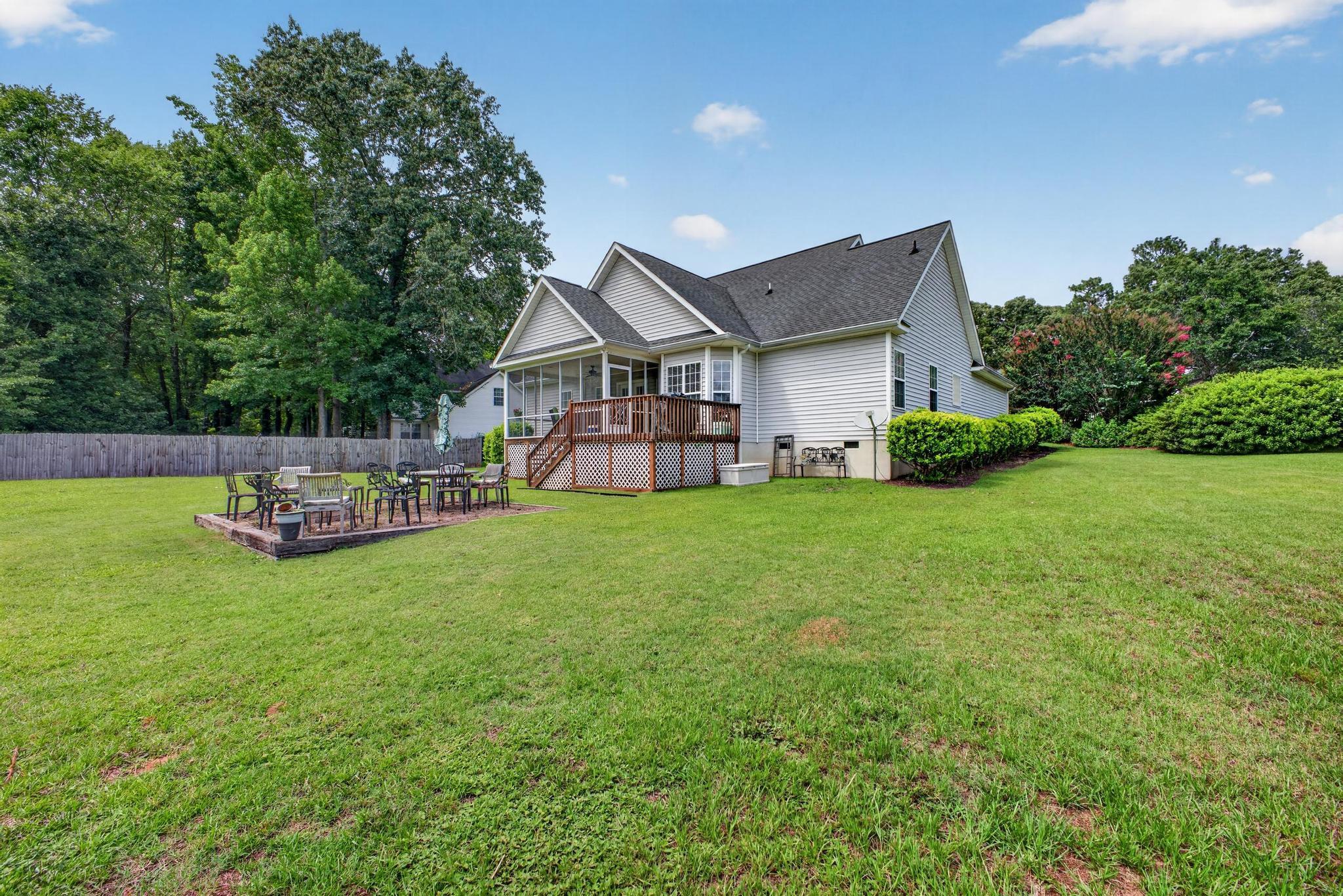 42 Emerald Ridge Aiken, SC 29803 - Photo 29 of 33 a view of a house with a yard and deck