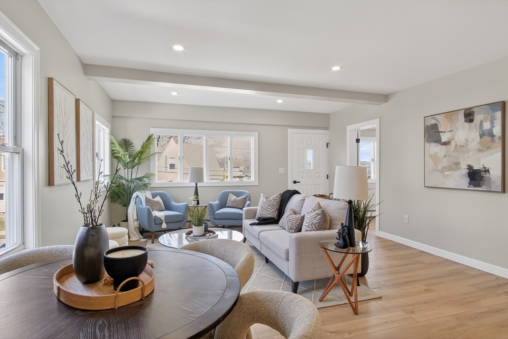 5 Springdale Avenue Saugus, MA 01906 - Photo 11 of 26 a living room with furniture and a potted plant