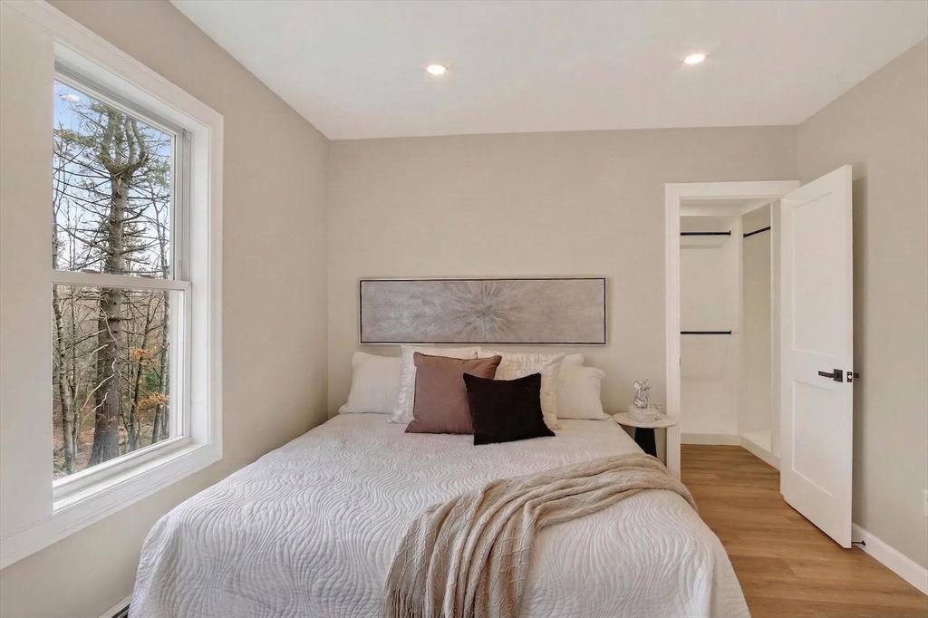 5 Springdale Avenue Saugus, MA 01906 - Photo 15 of 26 a bedroom with a large bed and a window