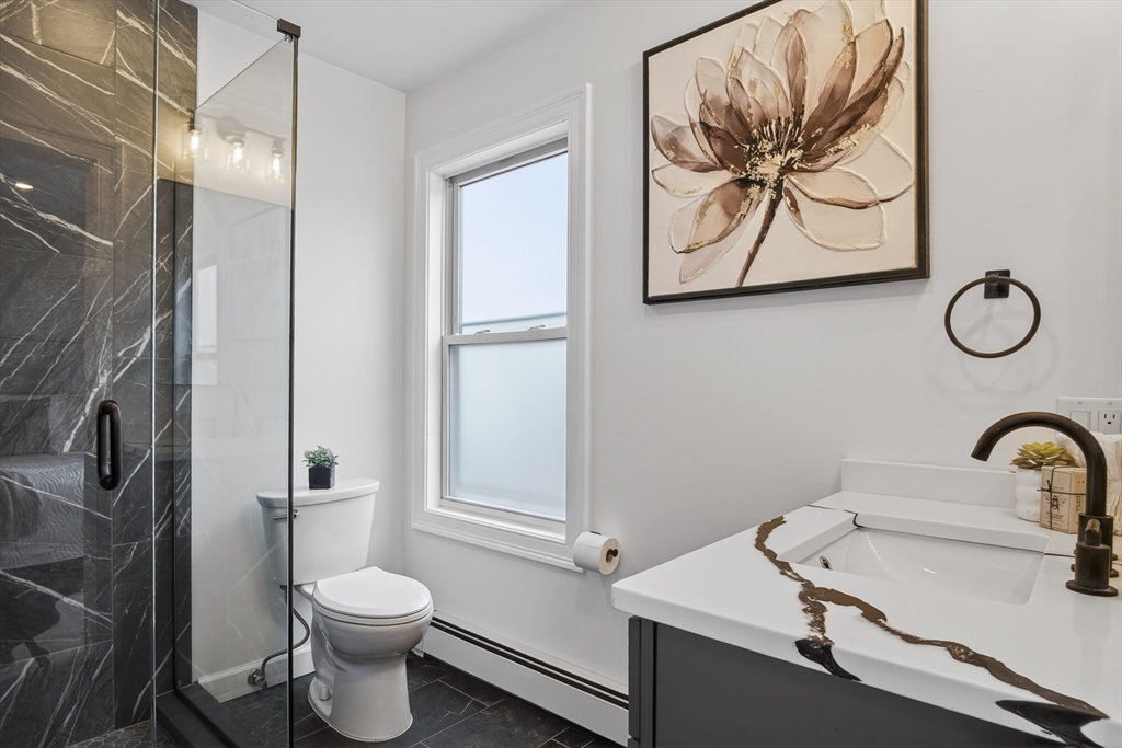 5 Springdale Avenue Saugus, MA 01906 - Photo 18 of 26 a bathroom with a sink and a toilet