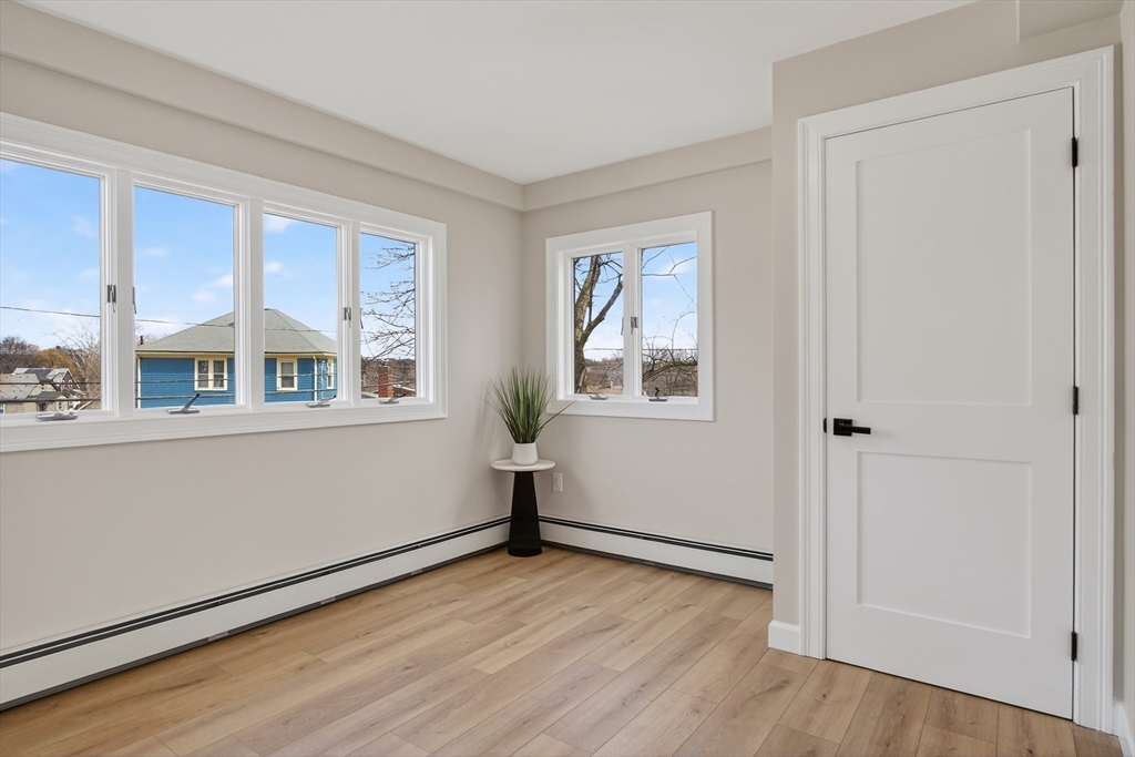 5 Springdale Avenue Saugus, MA 01906 - Photo 20 of 26 a view of empty room with wooden floor and fan