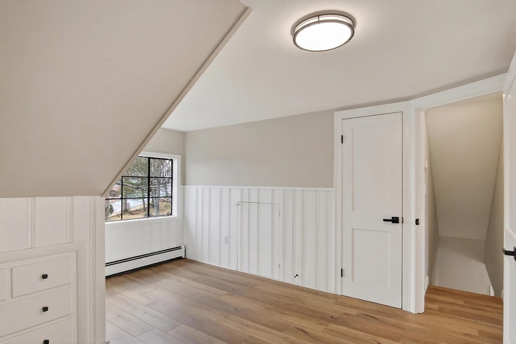 5 Springdale Avenue Saugus, MA 01906 - Photo 23 of 26 wooden floor in an empty room with a window