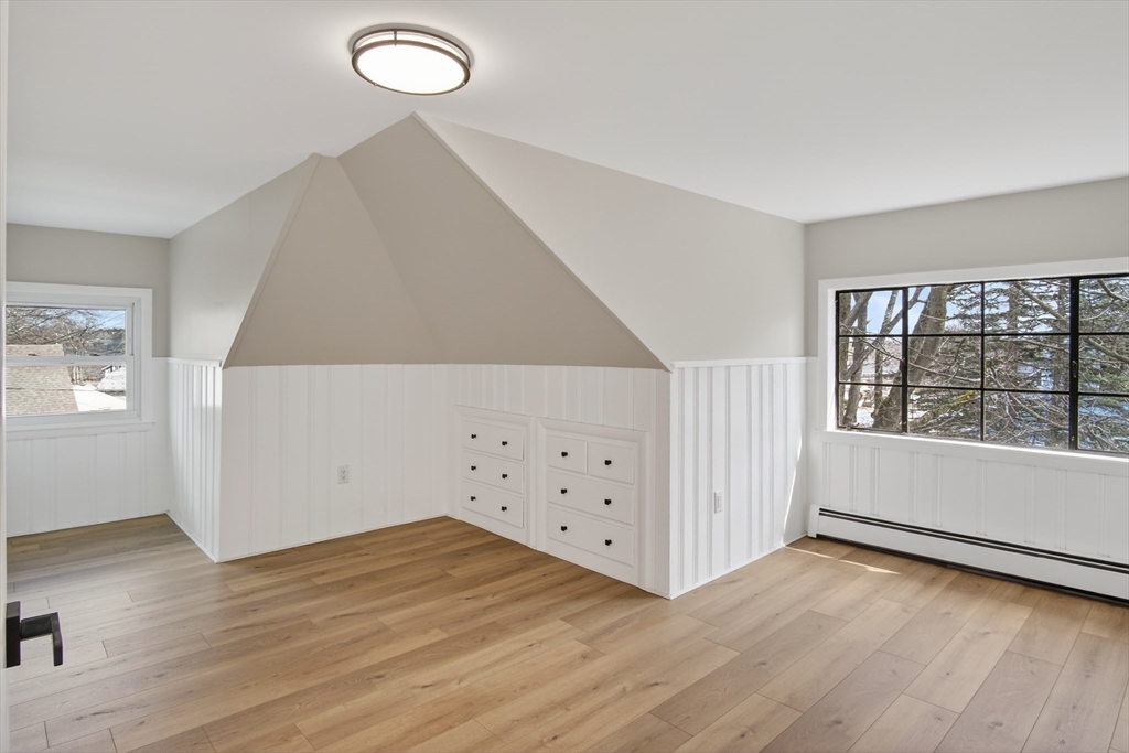 5 Springdale Avenue Saugus, MA 01906 - Photo 24 of 26 an empty room with wooden floor and windows