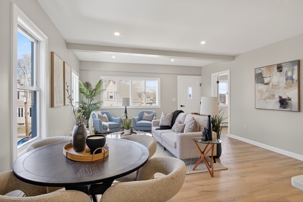 5 Springdale Avenue Saugus, MA 01906 - Photo 10 of 26 a living room with furniture and a potted plant