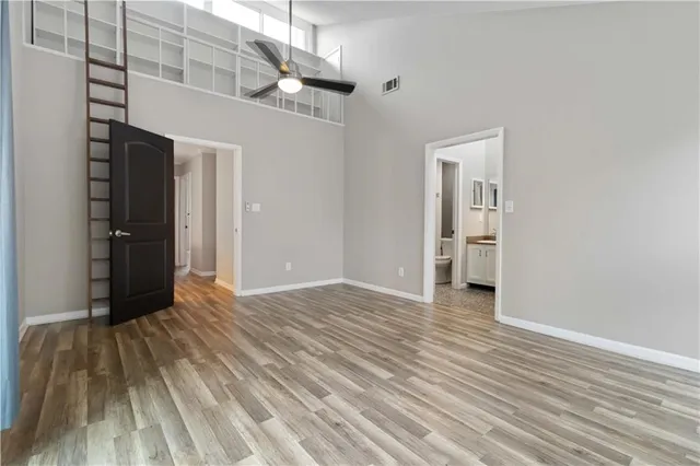 a view of a livingroom with wooden floor