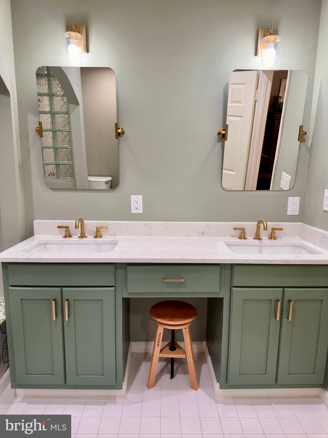 7929 Valleyfield Drive Springfield, VA 22153 - Photo 27 of 39 a bathroom with a sink and a mirror