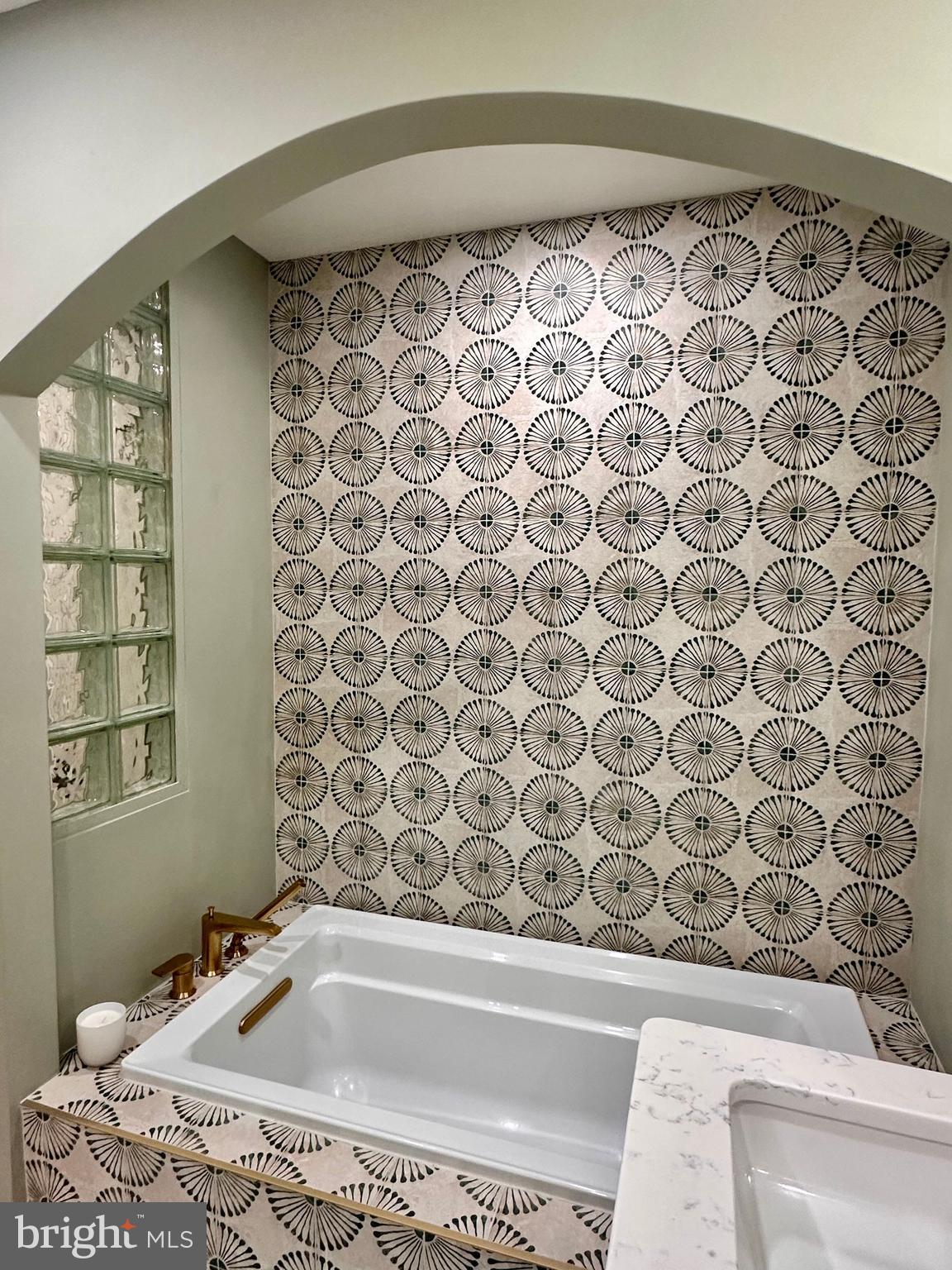 7929 Valleyfield Drive Springfield, VA 22153 - Photo 29 of 39 a bathroom with a bathtub and shower