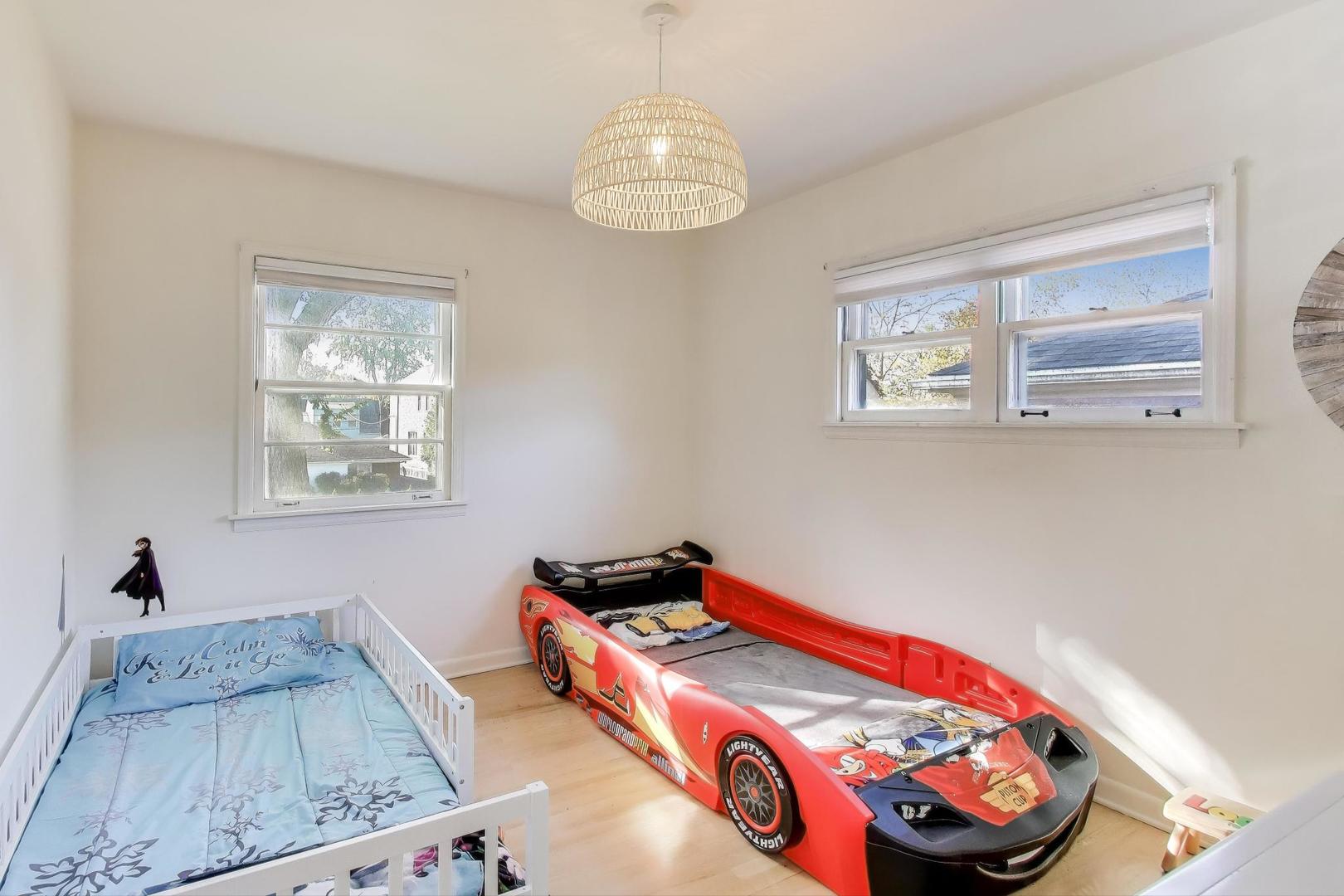 3131 Central Street Evanston, IL 60201 - Photo 13 of 28 a bedroom with bed and a window