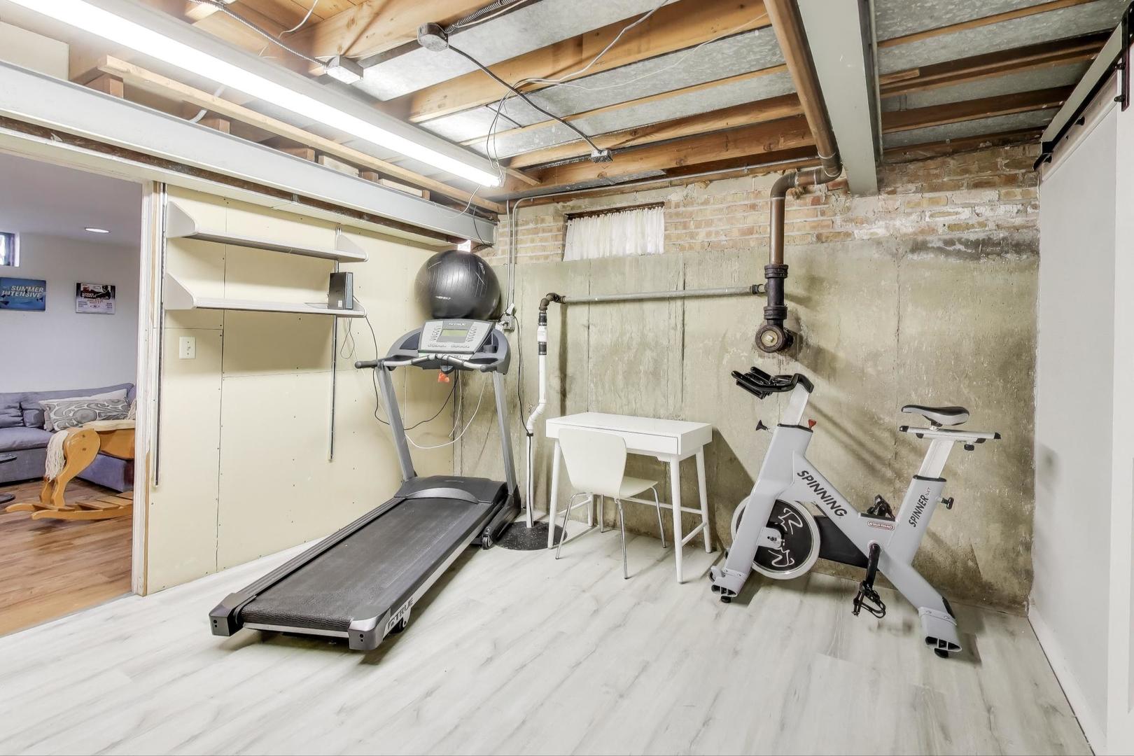 3131 Central Street Evanston, IL 60201 - Photo 20 of 28 a view of a room with gym equipment