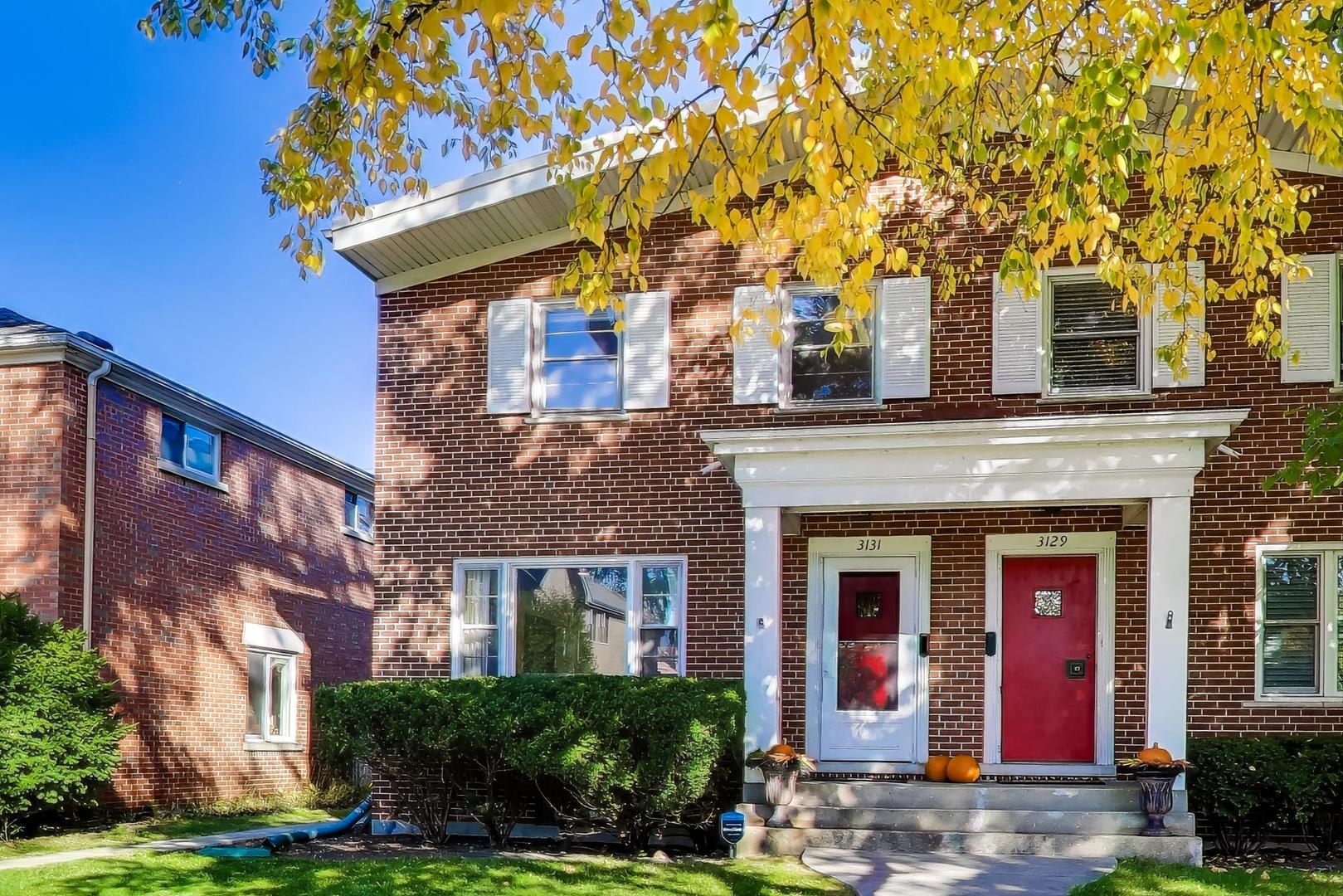 3131 Central Street Evanston, IL 60201 - Photo 2 of 28 front view of house with a tree