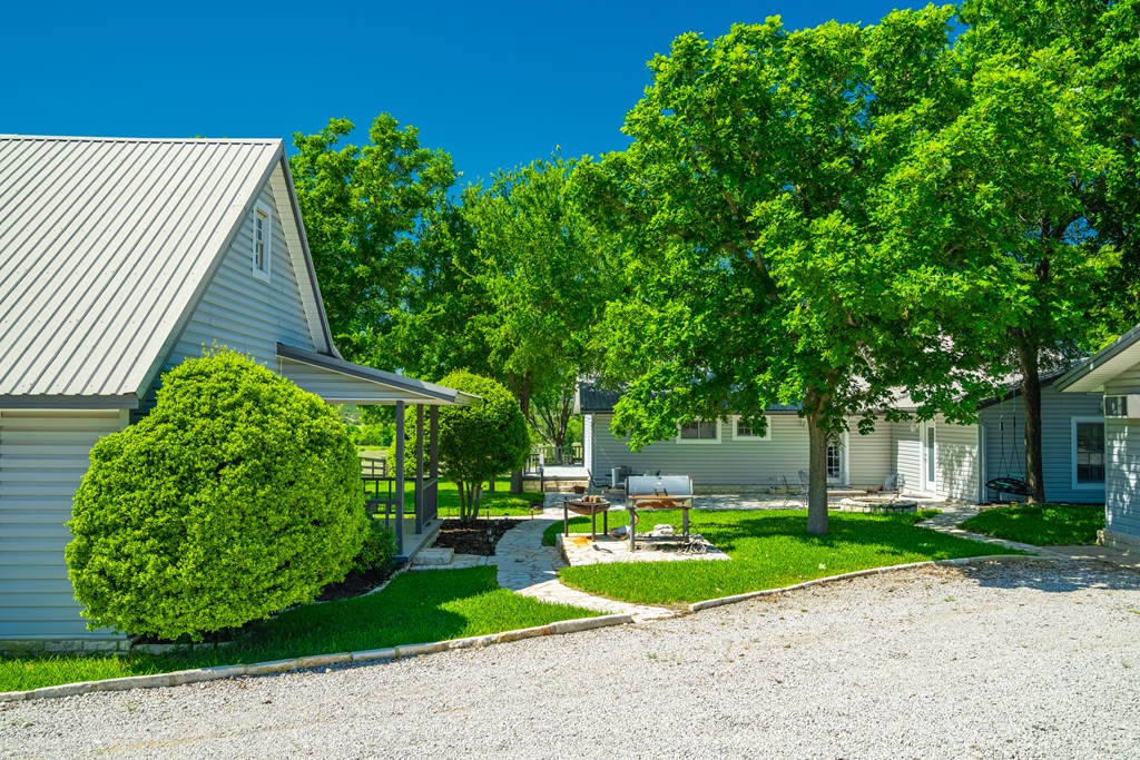 0 County Road Evant, TX 76525 - Photo 6 of 41 a view of a garden with plants and large trees