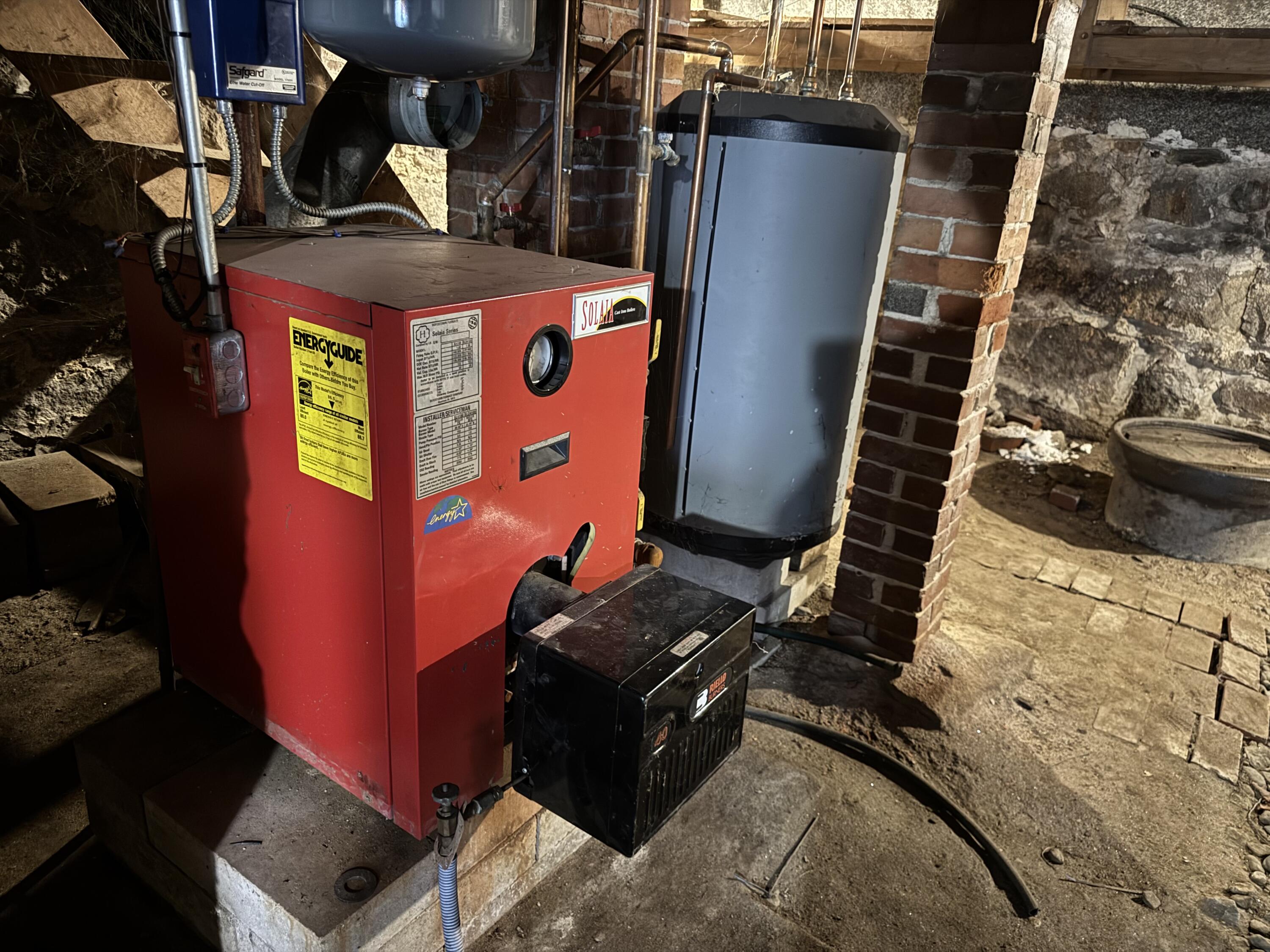 473 Goodwins Mills Road Lyman, ME 04002 - Photo 33 of 39 Boiler and HW tank