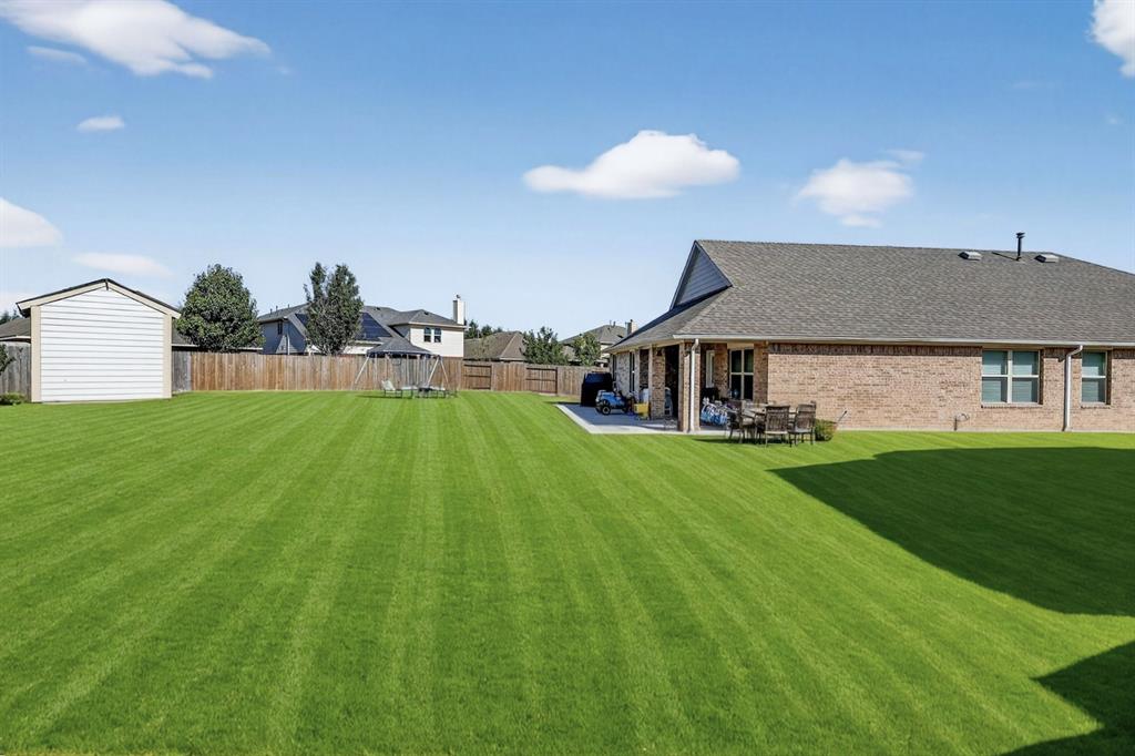22038 Pheasant Bend Lane Porter, TX 77365 - Photo 24 of 25 a view of house with garden