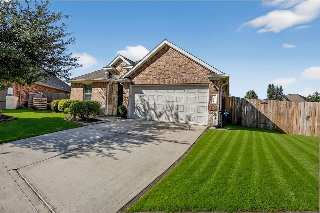 22038 Pheasant Bend Lane Porter, TX 77365 - Photo 3 of 25 a view of a house with backyard and garden