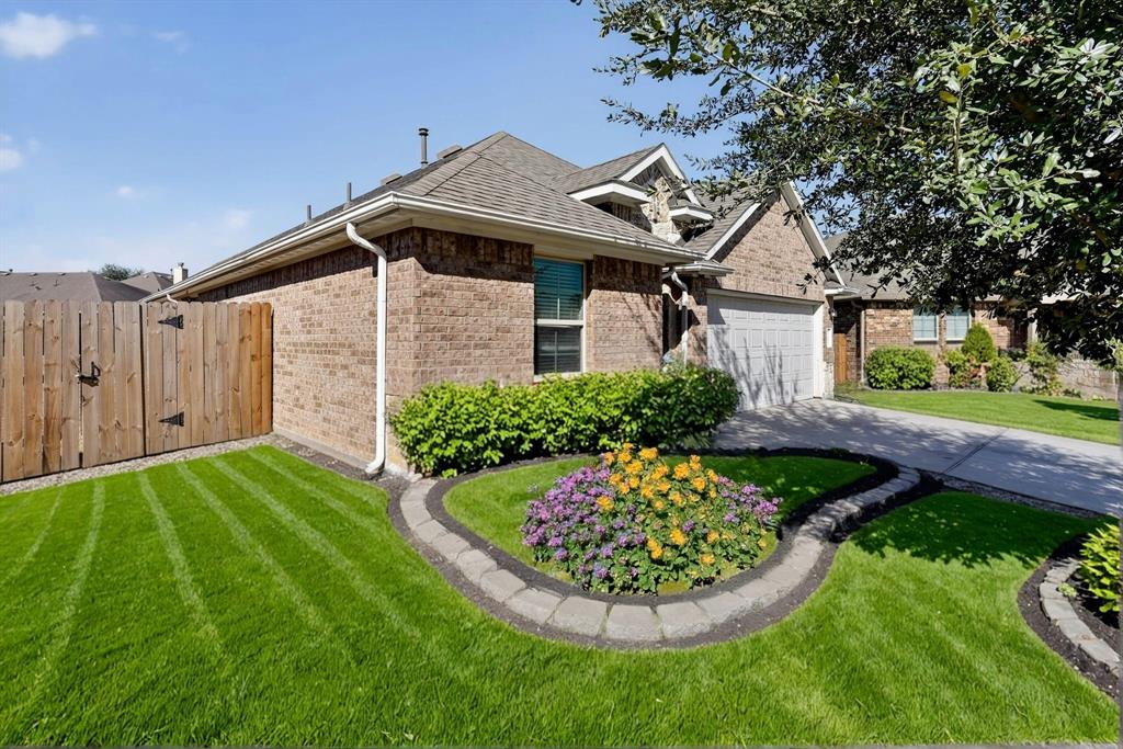 22038 Pheasant Bend Lane Porter, TX 77365 - Photo 4 of 25 a front view of a house with a yard