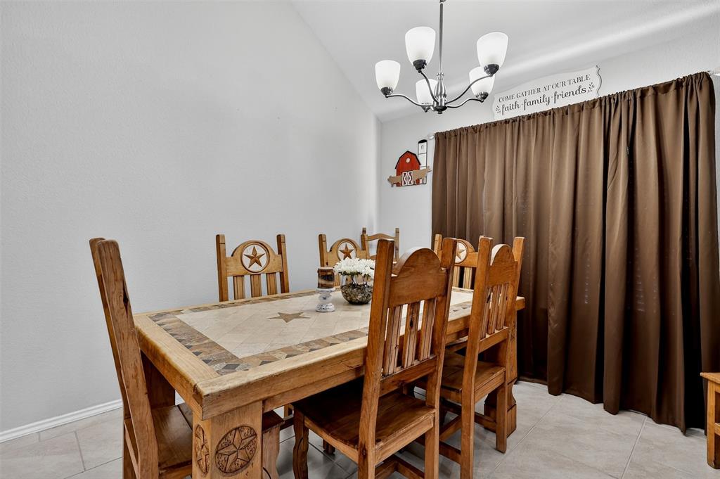 22038 Pheasant Bend Lane Porter, TX 77365 - Photo 9 of 25 a view of a dining room with furniture