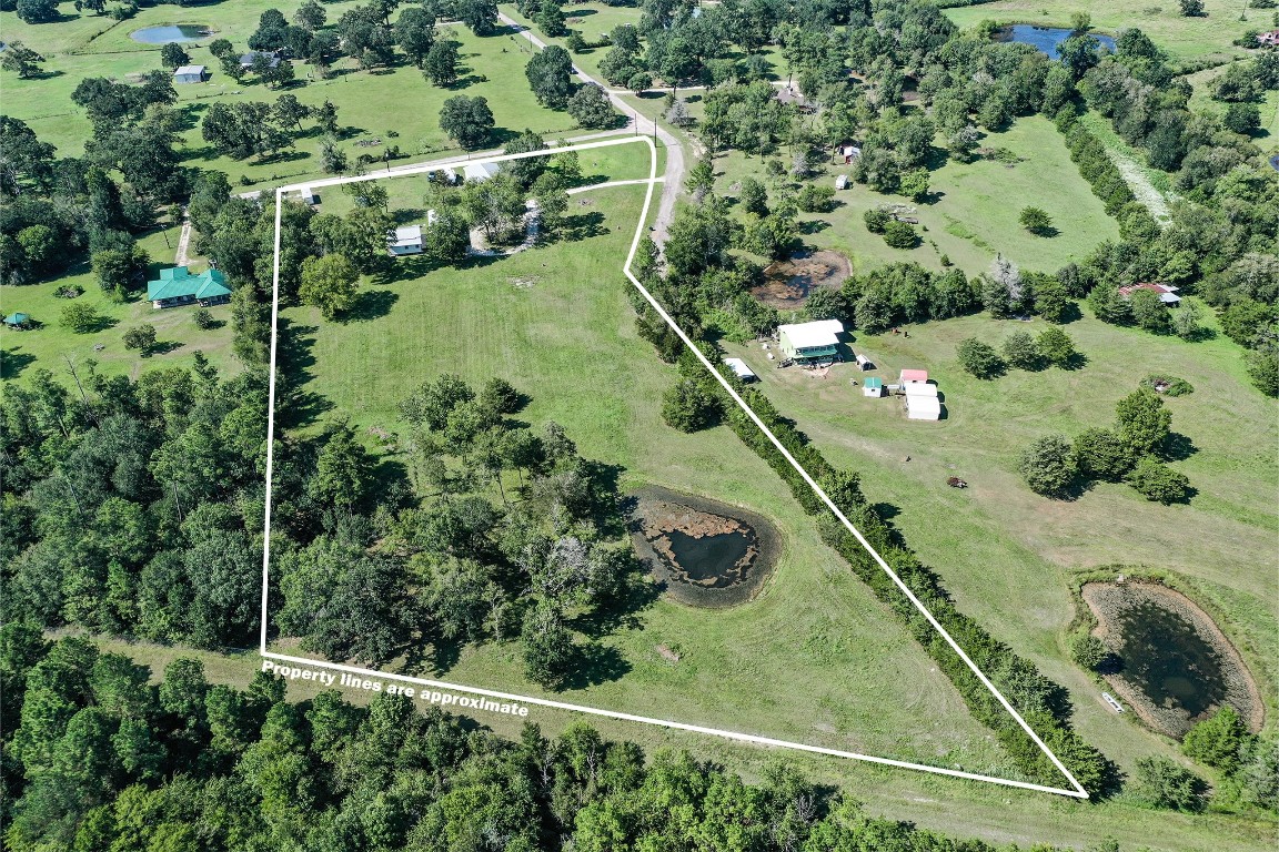 an aerial view of a yard with a garden