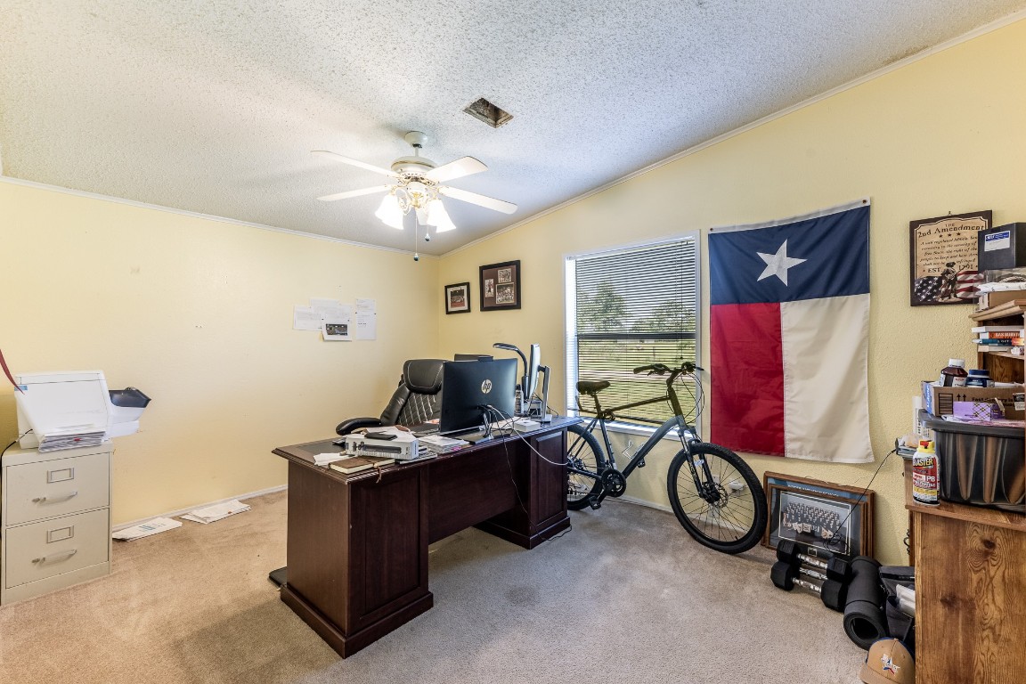 34 Harding Road Huntsville, TX 77340 - Photo 20 of 28 a view of a workspace with furniture