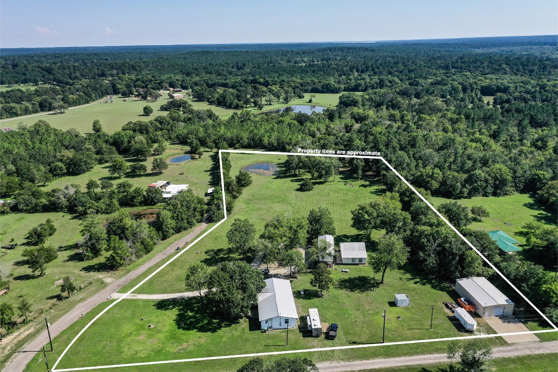 34 Harding Road Huntsville, TX 77340 - Photo 21 of 28 a view of a tennis court