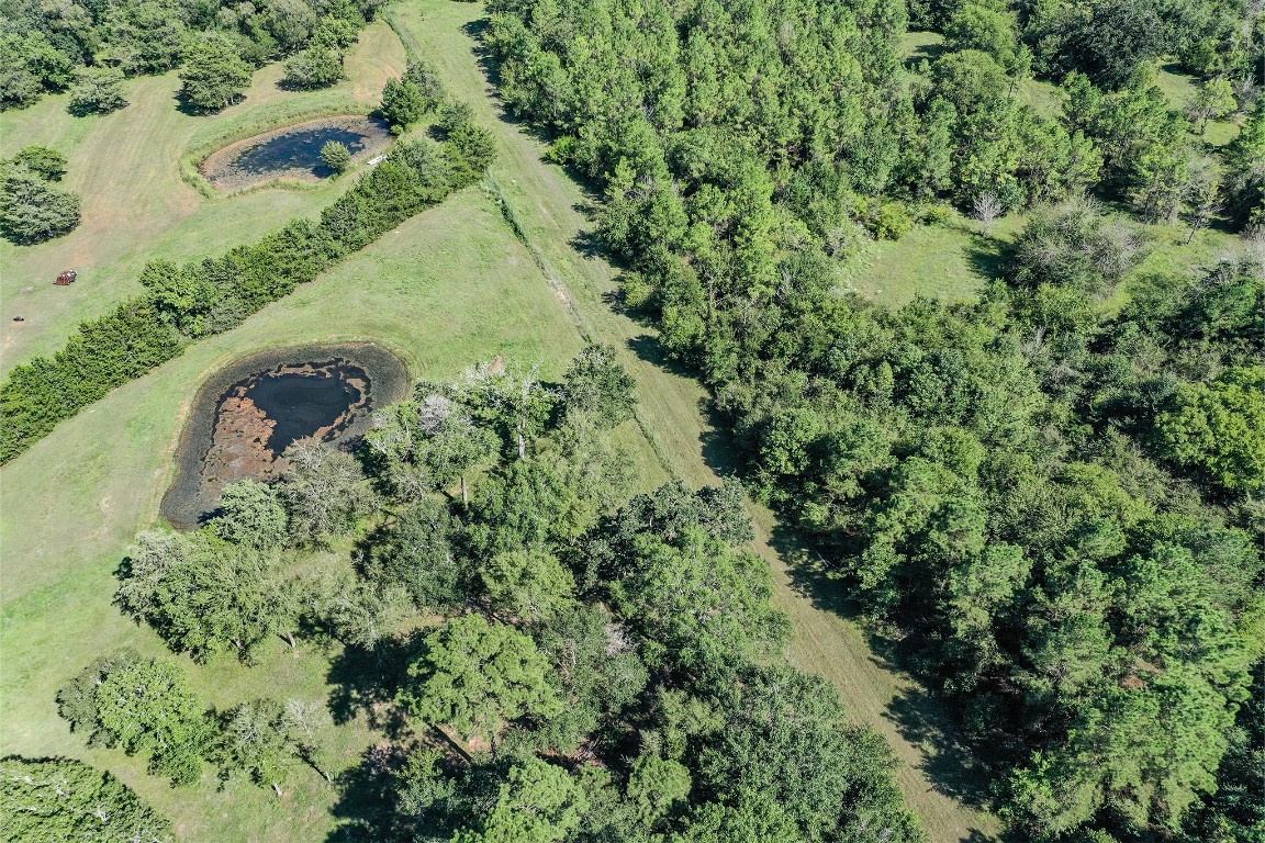 34 Harding Road Huntsville, TX 77340 - Photo 26 of 28 an aerial view of a residential houses with outdoor space
