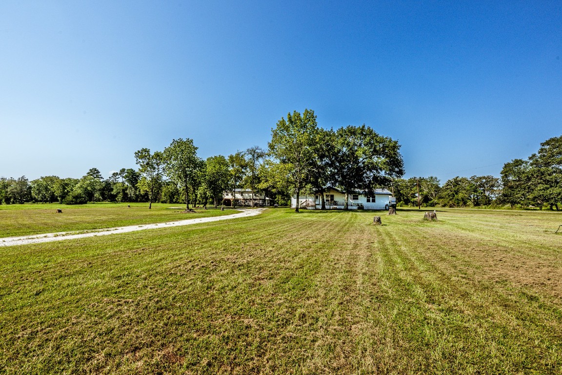34 Harding Road Huntsville, TX 77340 - Photo 3 of 28 a view of an outdoor space and swimming pool